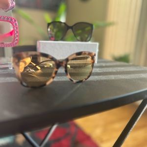 Michael Kors Sunglasses with case and lenses-cloth for sale.